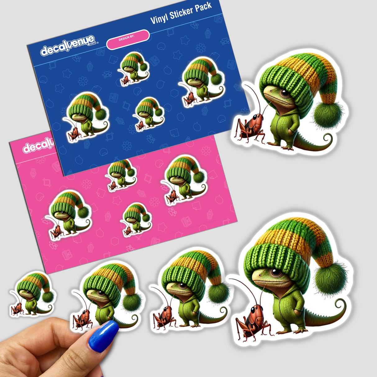 Lizard Gnome with Cricket stickers and digital art, featuring a whimsical lizard in a green and orange beanie, available in vibrant blue and pink packaging by Decalvenue.