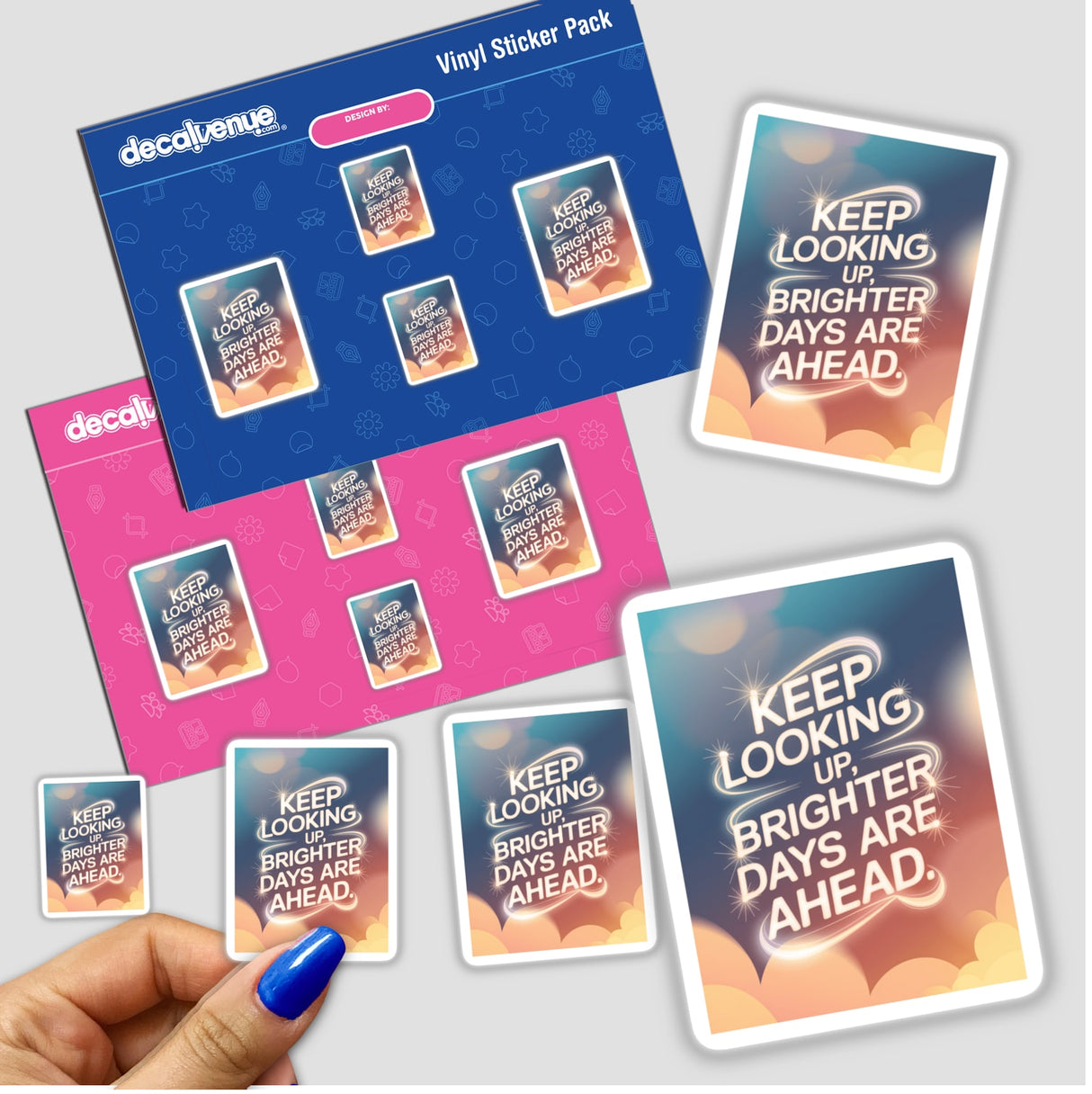 Hand holding stickers with text: Keep looking up, brighter days are ahead, showcasing unique vinyl stickers available as physical or digital artwork from Decal Venue.