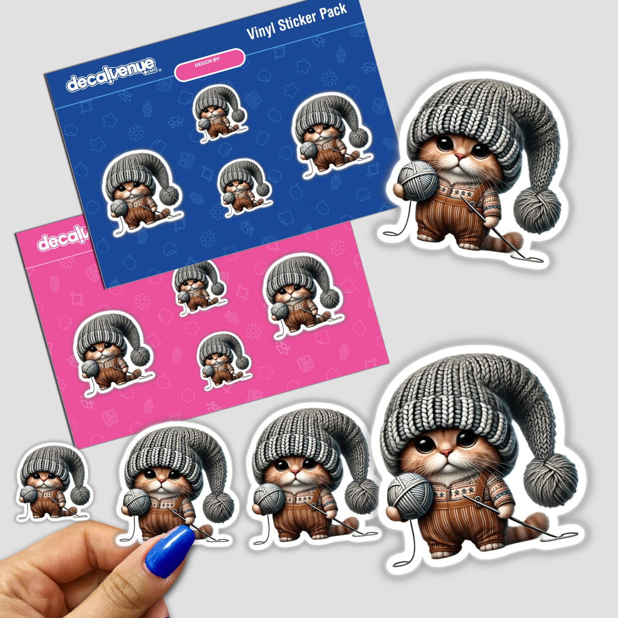 Sticker pack of Scottish Fold Cat Gnome holding a ball of yarn, featuring a cartoon cat in a knitted hat and overalls. Available as Stickers or Digital Artwork.
