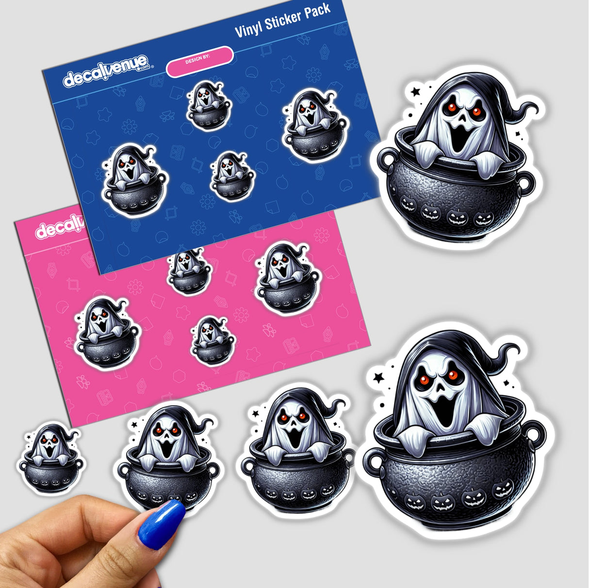 Spooky stickers with a ghost peeking out from a cauldron, featuring a variety of Halloween-themed digital artwork by DecalVenue.