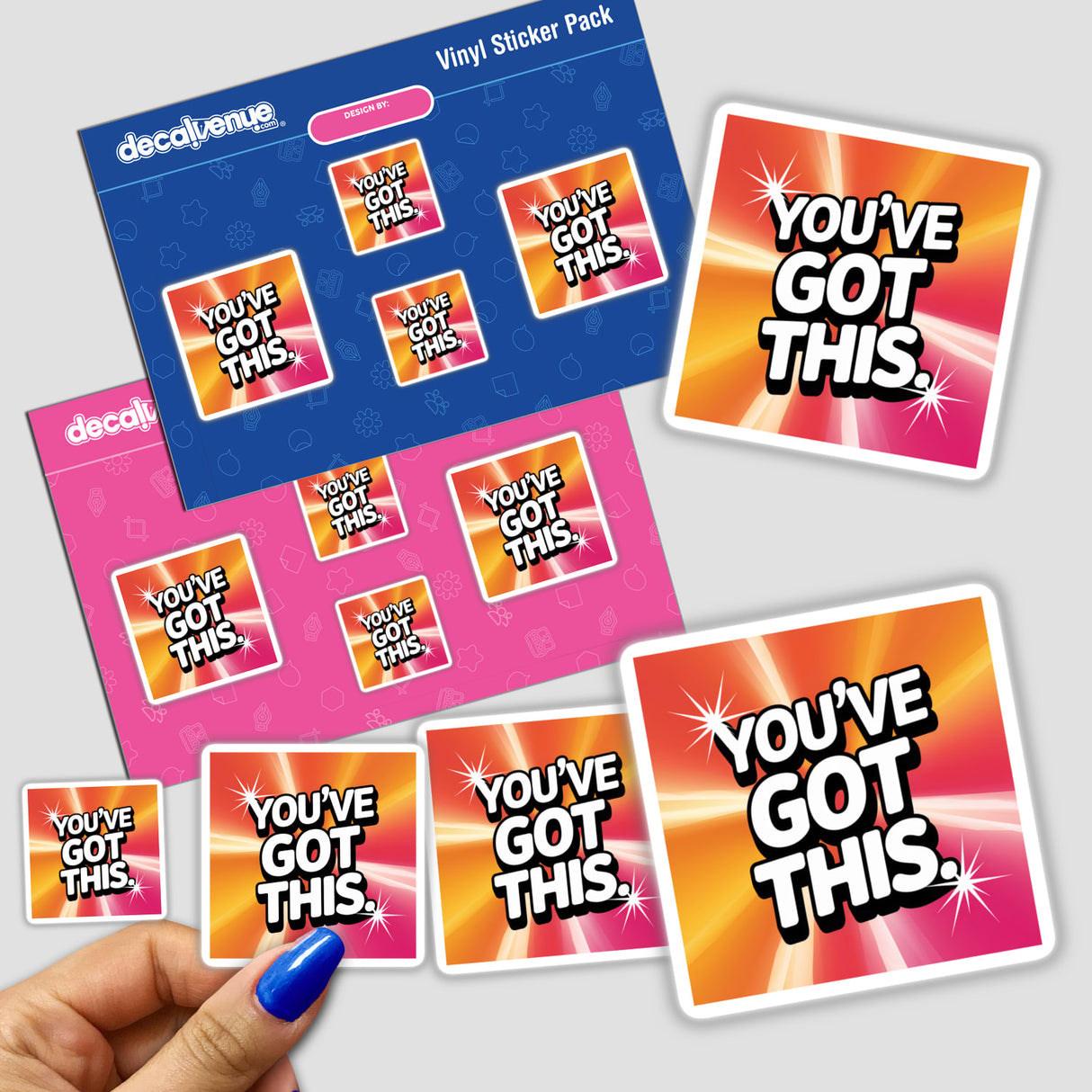 Hand holding a You’ve got this sticker pack, showcasing colorful square stickers with text, emphasizing motivational design, available as vinyl stickers or digital artwork from Decal Venue.