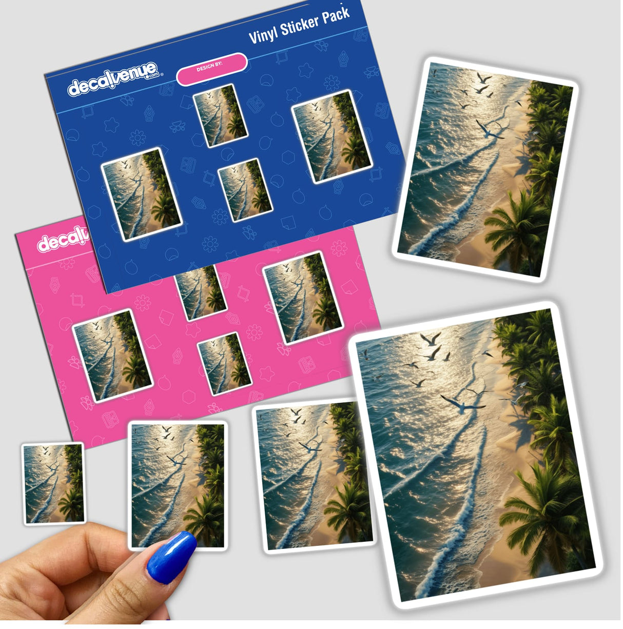 Golden Waves Seagulls Over Tropical Beach sticker pack, showcasing vibrant seagulls flying over a serene beach, held by a hand with blue nail polish. Available as stickers or digital artwork.
