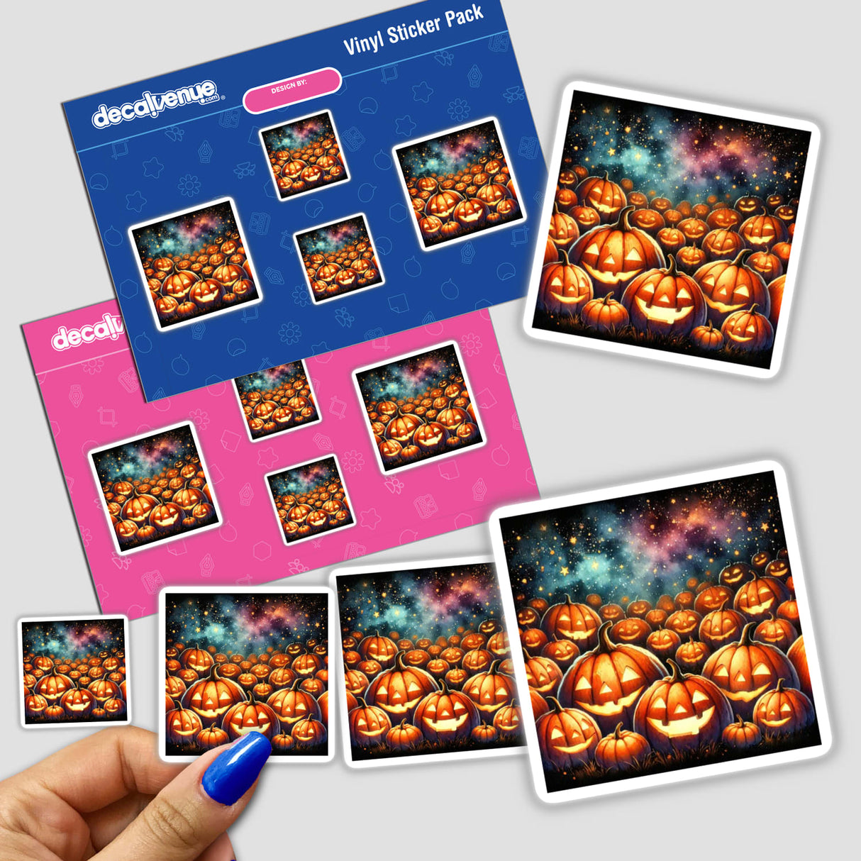 Hand holding the Pumpkin Patch - Glowing Jack-o'-Lanterns Watercolor sticker pack, featuring various pumpkins with lights and stars.
