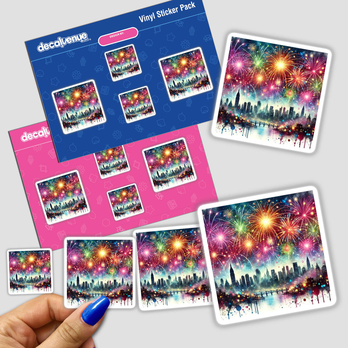Hand holding a sticker pack titled New Year’s Sparkle - Fireworks Over a Cityscape, featuring vibrant fireworks above a cityscape. Available as stickers or digital artwork from Decal Venue.