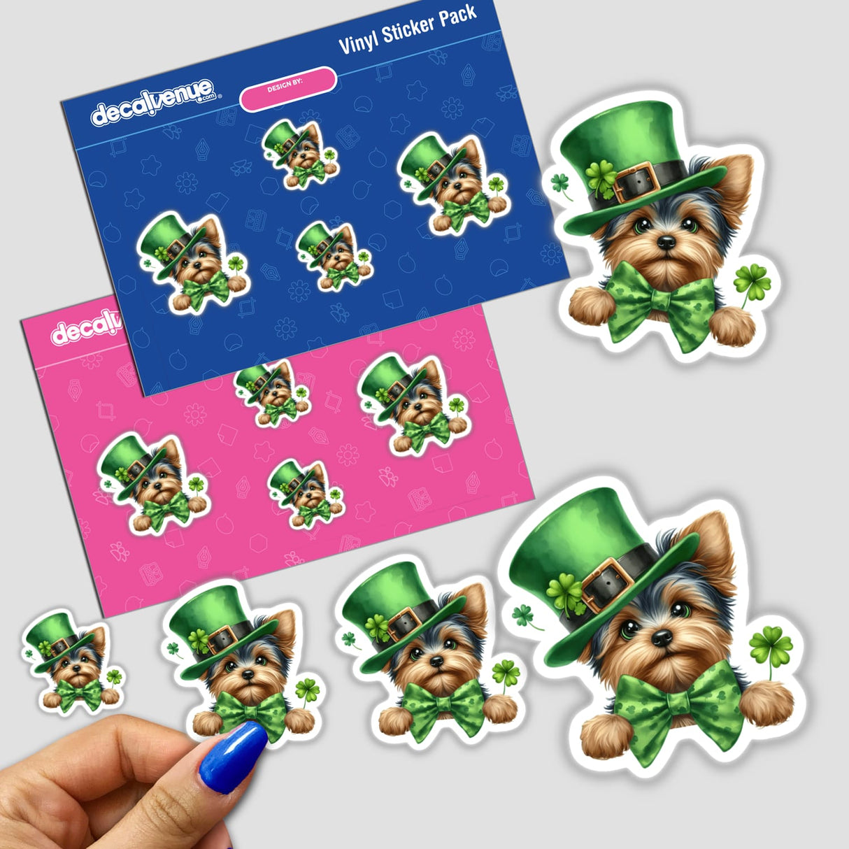 Watercolor Peeking St Patricks Yorkie Dog stickers featuring a cartoon Yorkie wearing a green hat, bow tie, and surrounded by clovers. Available as stickers or digital artwork.