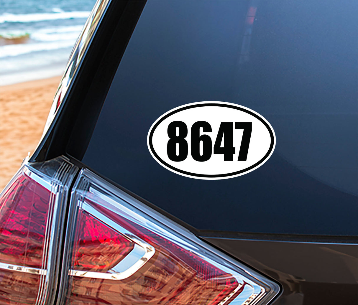 FDT Oval Vinyl Bumper Stickers (3 Pack) displayed on a car, featuring a high-definition black number on a white oval background, showcasing their suitability for automotive use.