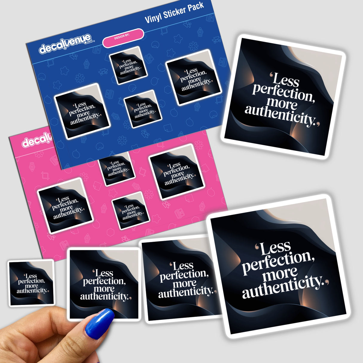 Hand displaying sticker pack titled Less perfection, more authenticity from Decal Venue, showcasing unique vinyl stickers offered as both physical and digital art.