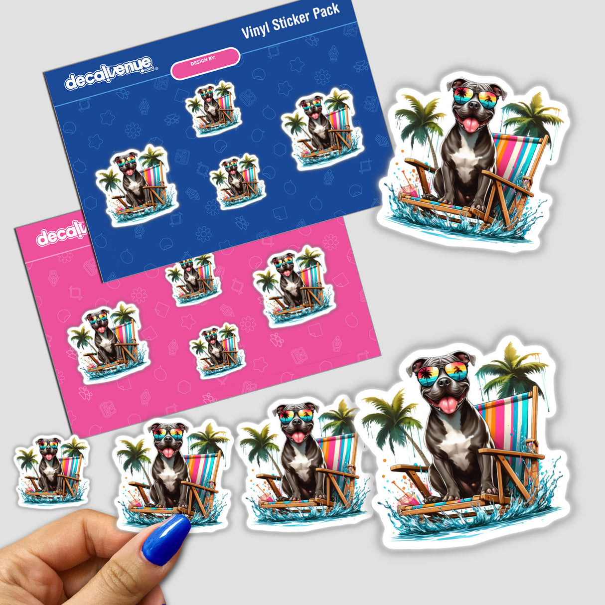 Hand holding a Splashing Beach Time Pitbull Dog sticker pack, featuring a cartoon pitbull wearing sunglasses on a beach chair. Available as stickers or digital artwork from Decal Venue.