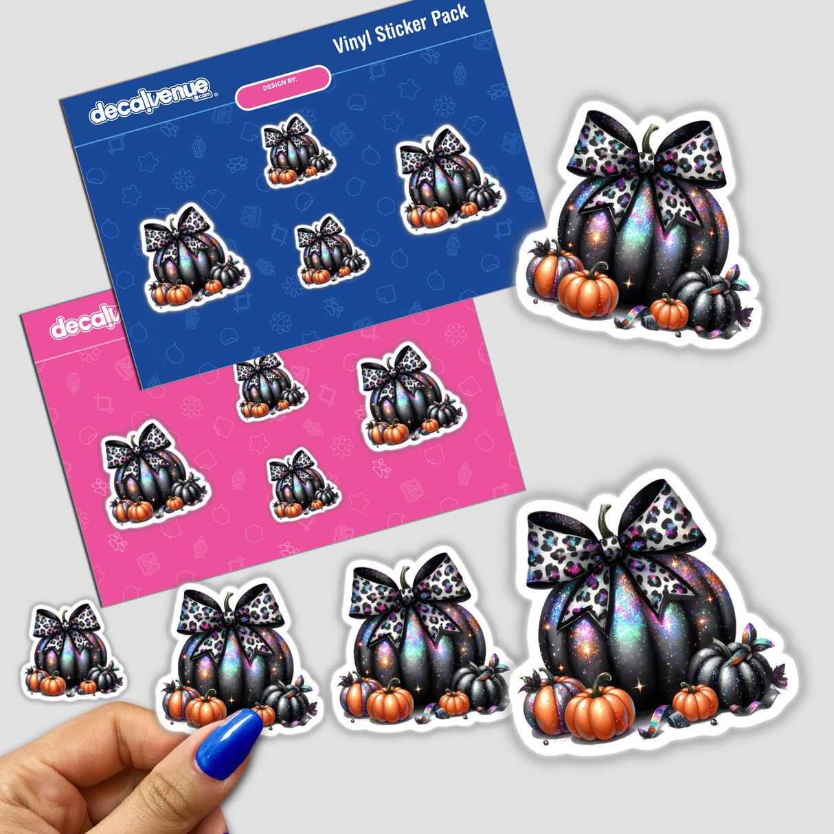 Sticker featuring a pumpkin with a leopard print bow, titled Prismatic Leopard Coquette Bow Pumpkin, held by a hand with blue nail polish.