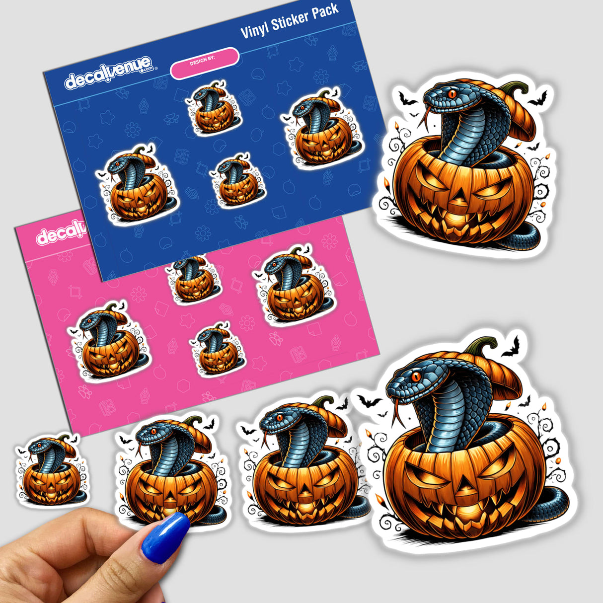 Colorful Halloween digital stickers featuring a cobra snake peeking out of an elaborately carved pumpkin, created by Decal Venue.