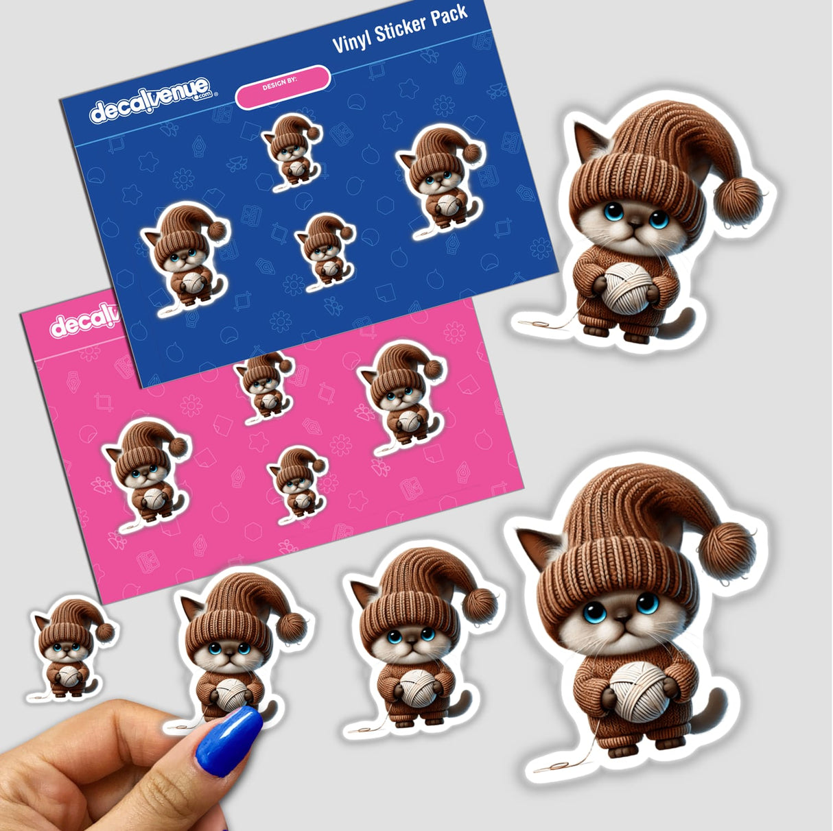Adorable Burmese cat gnome stickers holding a ball of yarn, featured on a vibrant vinyl sticker pack from Decal Venue, an online store selling unique digital artwork and stickers.