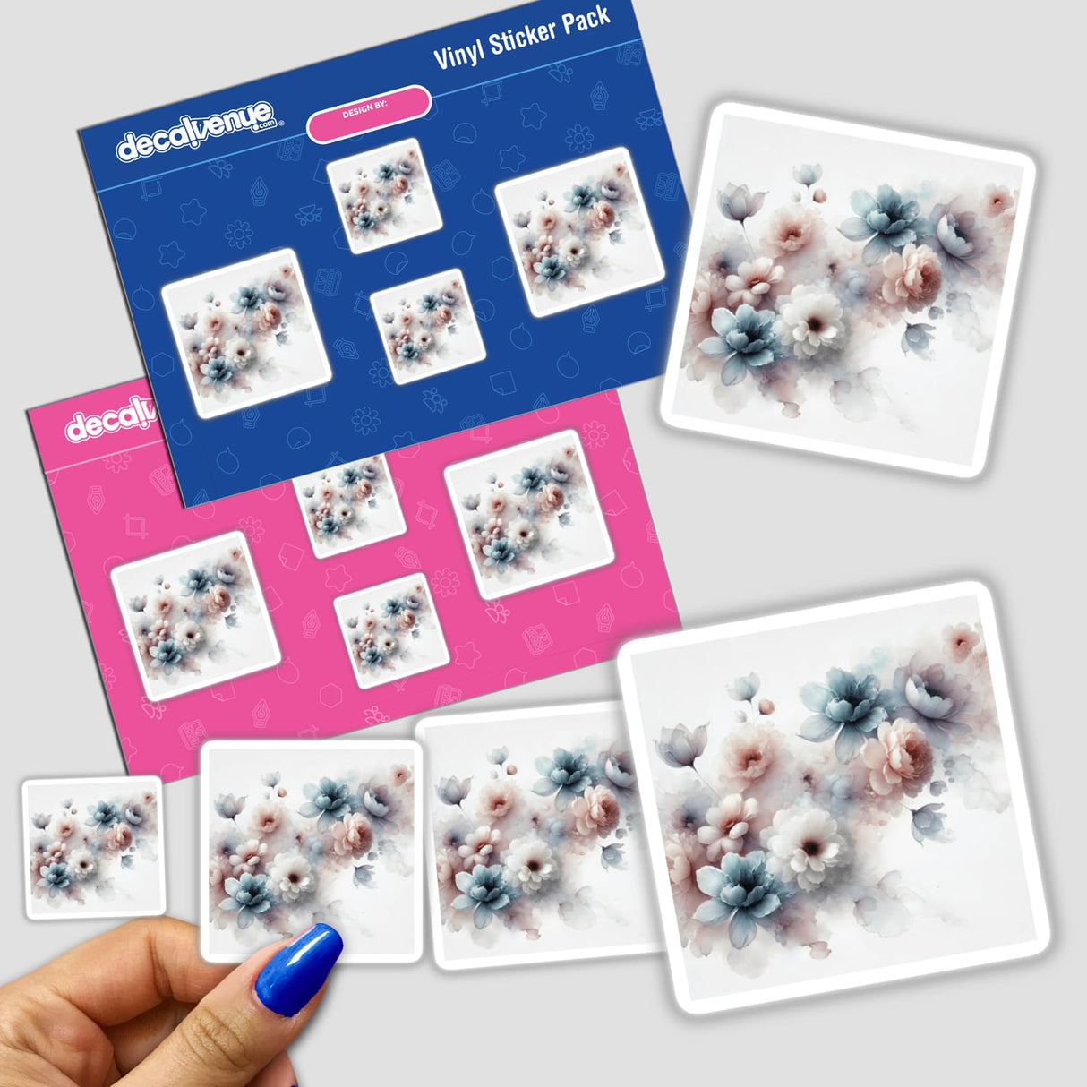 Hand holding a sticker pack labeled Ethereal Blossoms - Floating Floral Watercolors, featuring intricate flower designs.