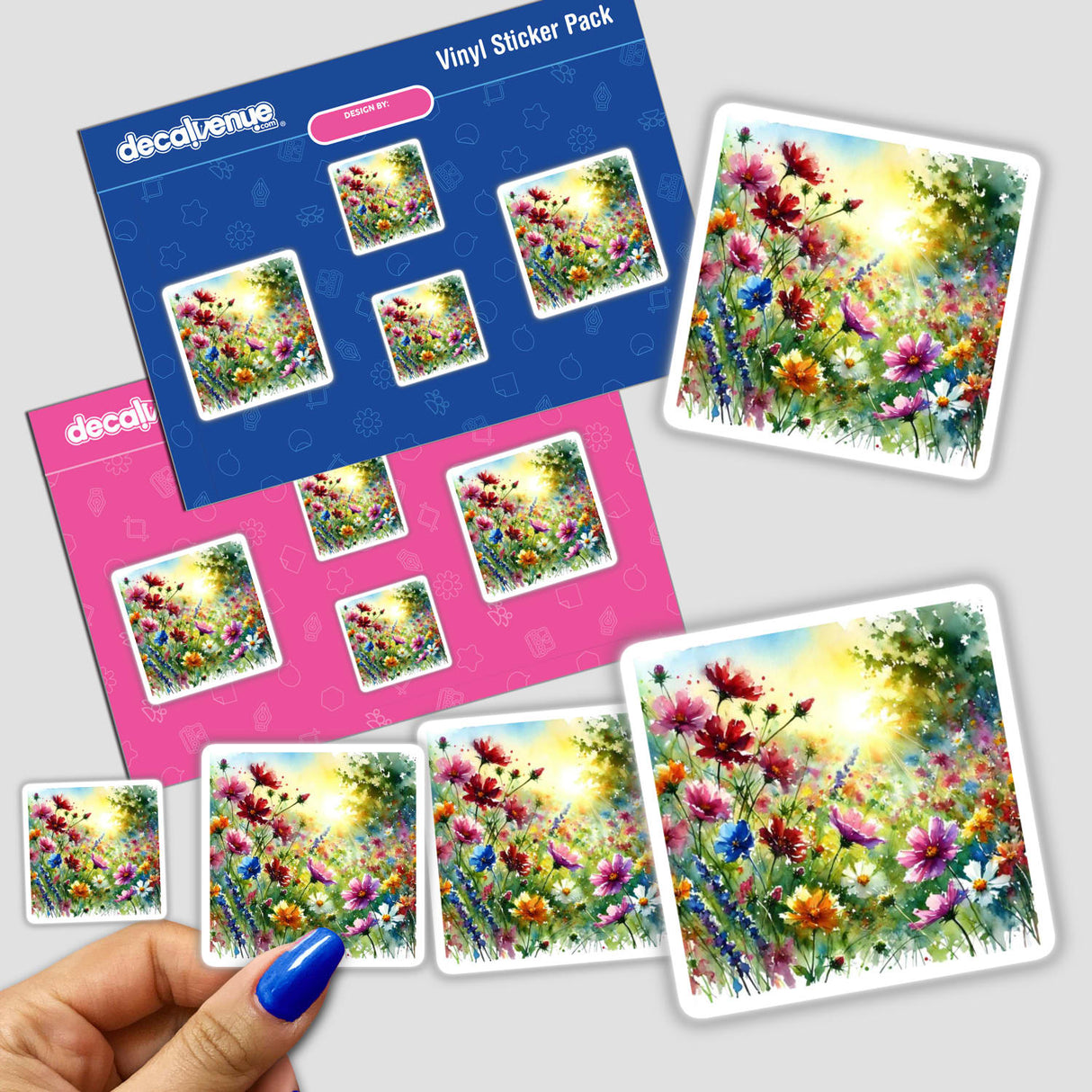Hand holding a sticker pack titled Wild Meadow - Field of Flowers in Bloom, featuring vibrant floral designs.