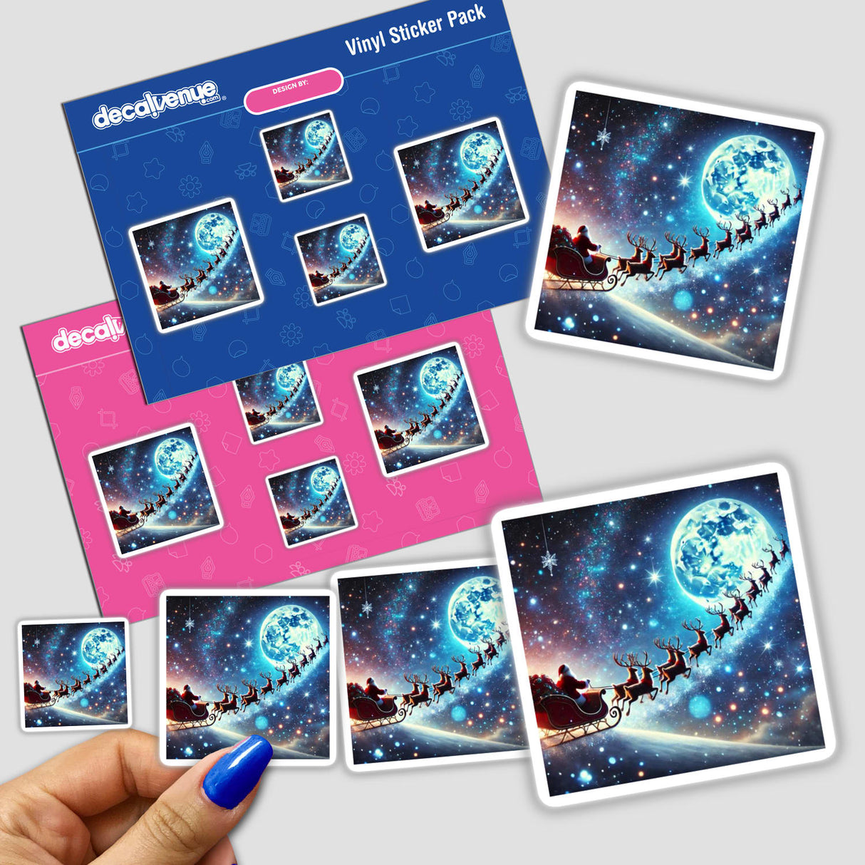 Hand holding a sticker pack titled Starlit Sleigh - Santa’s Sleigh Flying Across a Starry Sky featuring Santa Claus riding a sleigh with reindeers.