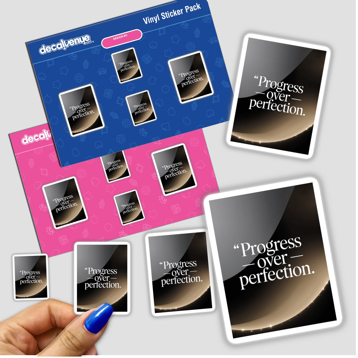 Hand holding a sticker pack featuring the text Progress Over Perfection, highlighting a unique vinyl design, available as stickers or digital artwork from Decal Venue.