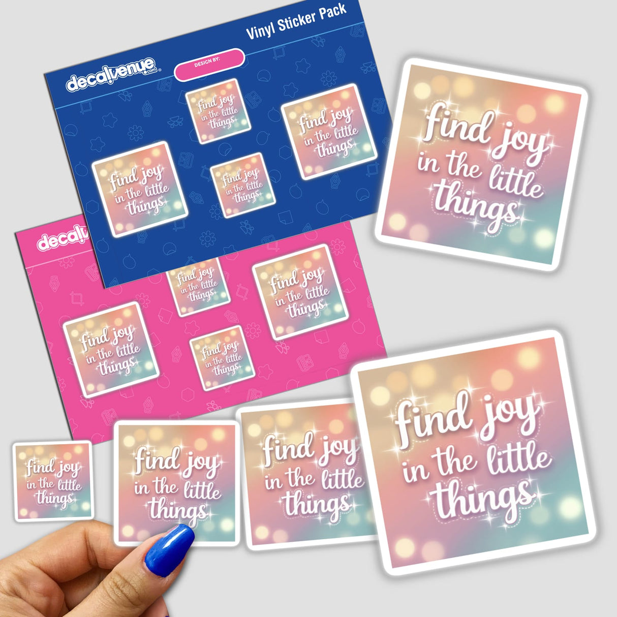 Hand holding a sticker pack titled Find joy in the little things, featuring vibrant designs, available as stickers or digital artwork from Decal Venue.