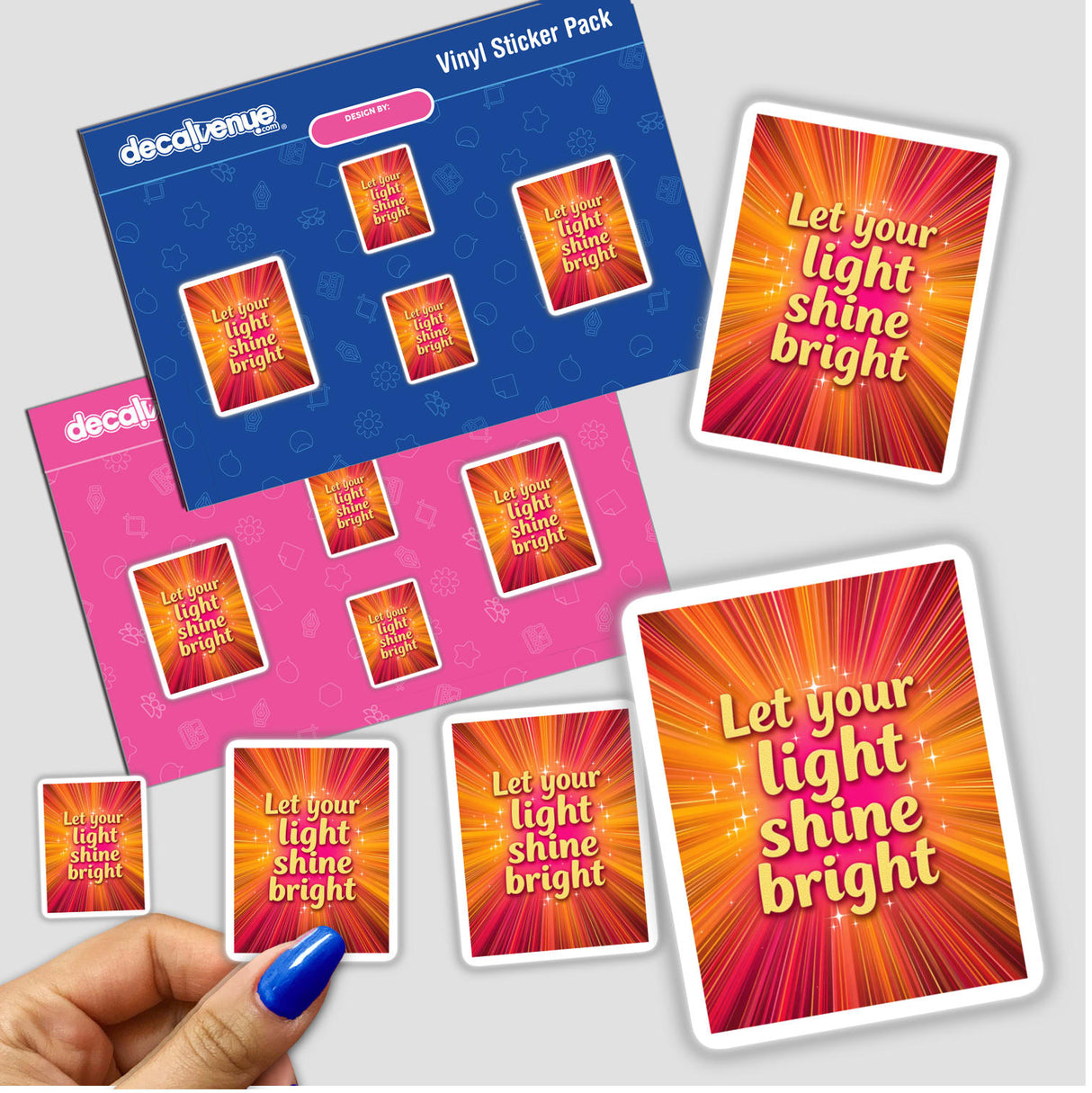 Hand holding vinyl stickers titled Let your light shine bright, showcasing intricate design elements available as both physical stickers and digital artwork from Decal Venue.