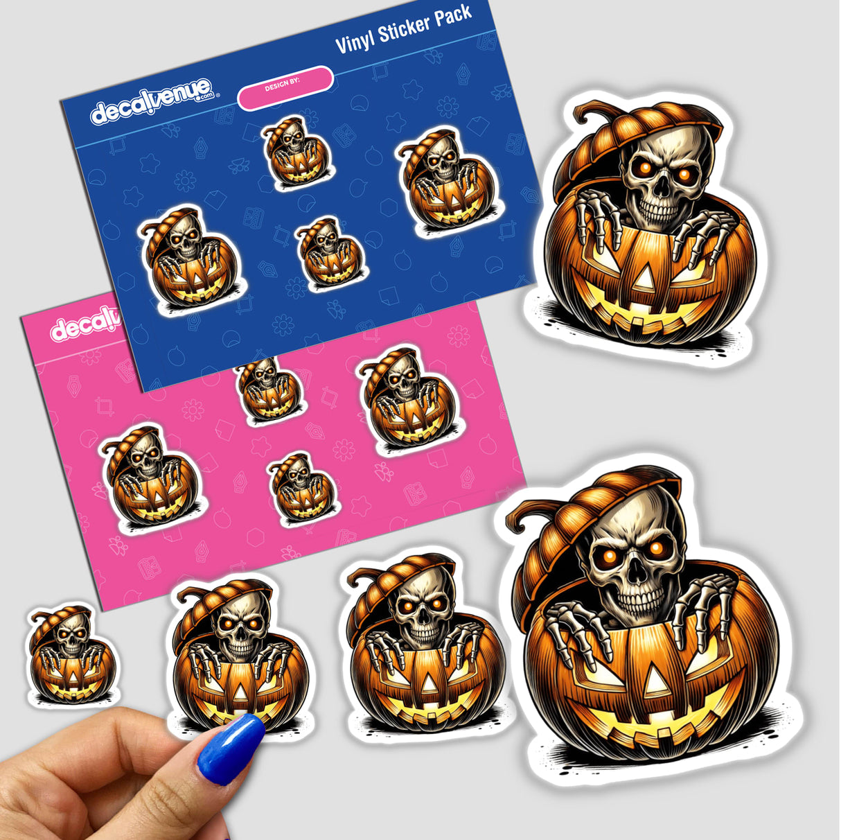 Skeleton peeking out of pumpkin Halloween digital art stickers showcased on pink and blue vinyl packaging for DecalVenue store