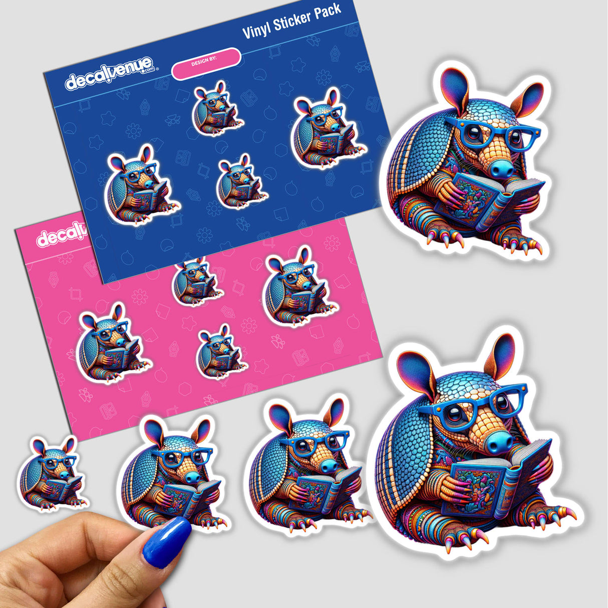 Cartoon armadillo with reading glasses and an open book, available as stickers or digital artwork, embodying Decal Venue's unique vinyl sticker and digital art collection.