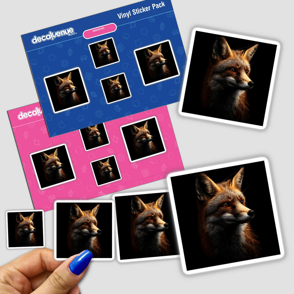 Hand holding a sticker pack featuring a Cinematic Fox Portrait on Black Background, showcasing multiple detailed fox face illustrations.