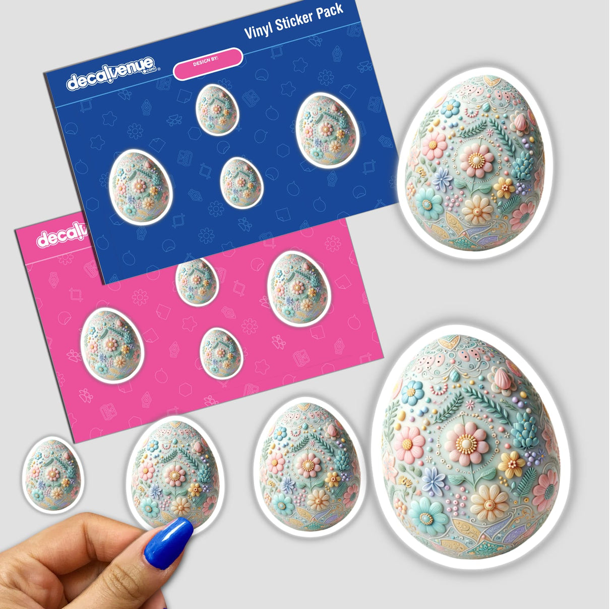 Decorative Easter Egg with Floral Design sticker pack featuring vibrant eggs adorned with flowers, perfect for Easter celebrations. A hand is seen holding one of the stickers. Available as stickers or digital artwork.