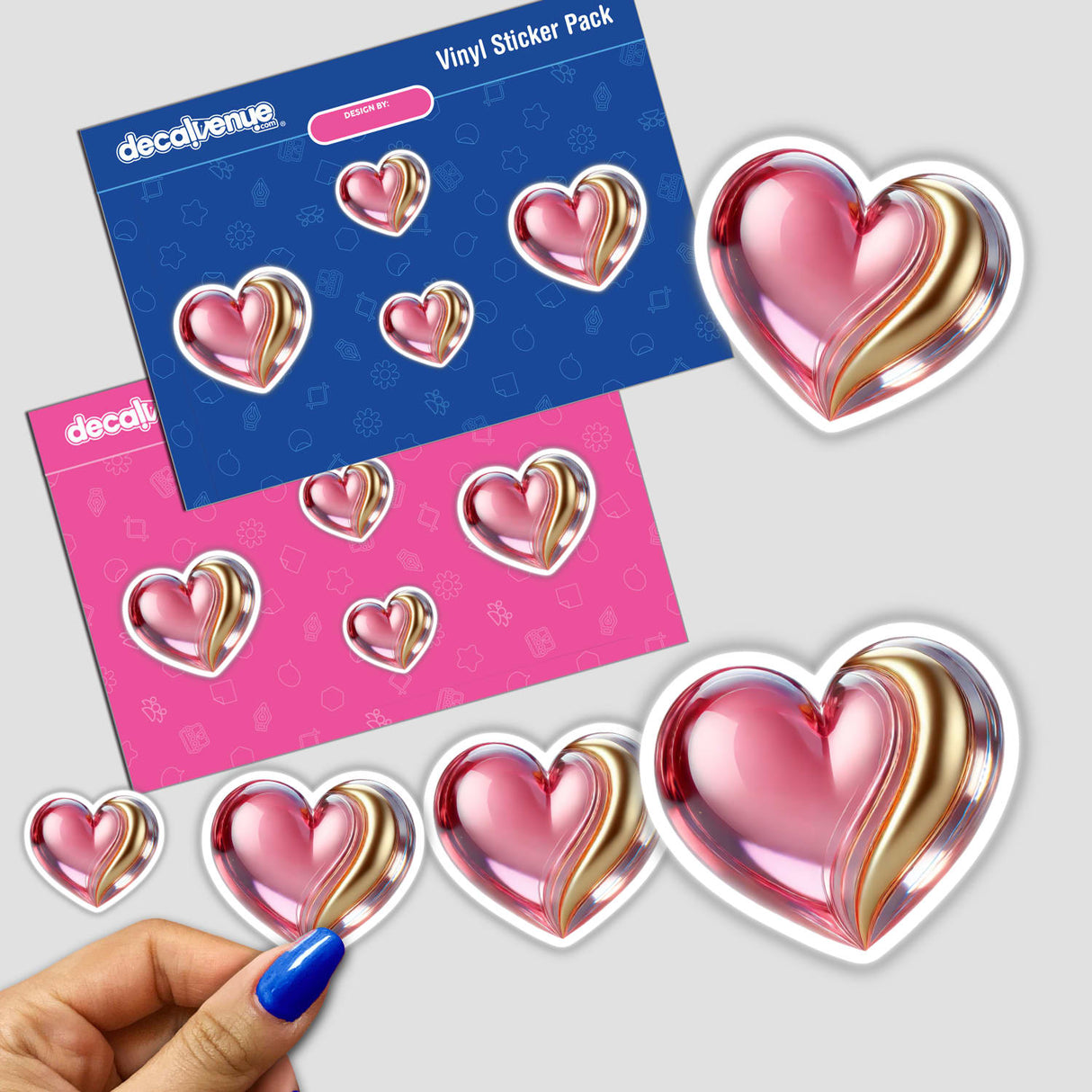 Heart Pink and Gold sticker pack featuring various heart-shaped designs, including a close-up of a finger holding one sticker. Available as stickers or digital artwork.