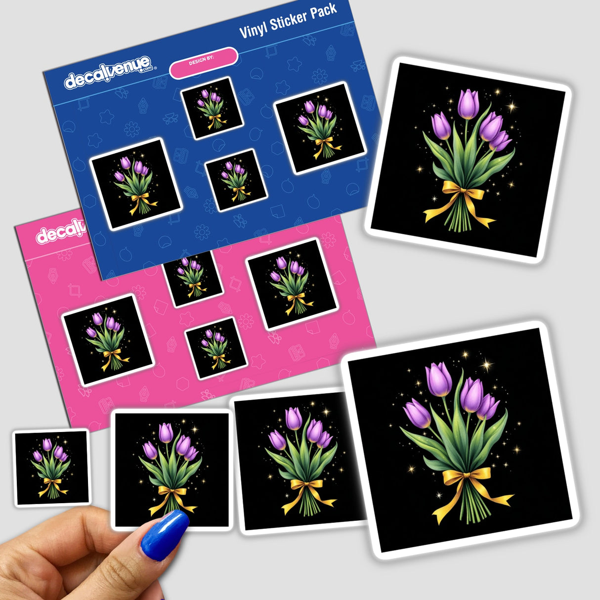 Sticker pack titled Purple Tulip Bouquet with Yellow Ribbon and Silver Stars, showing vibrant floral designs in a hand, embodying Decal Venue's unique sticker art collection.