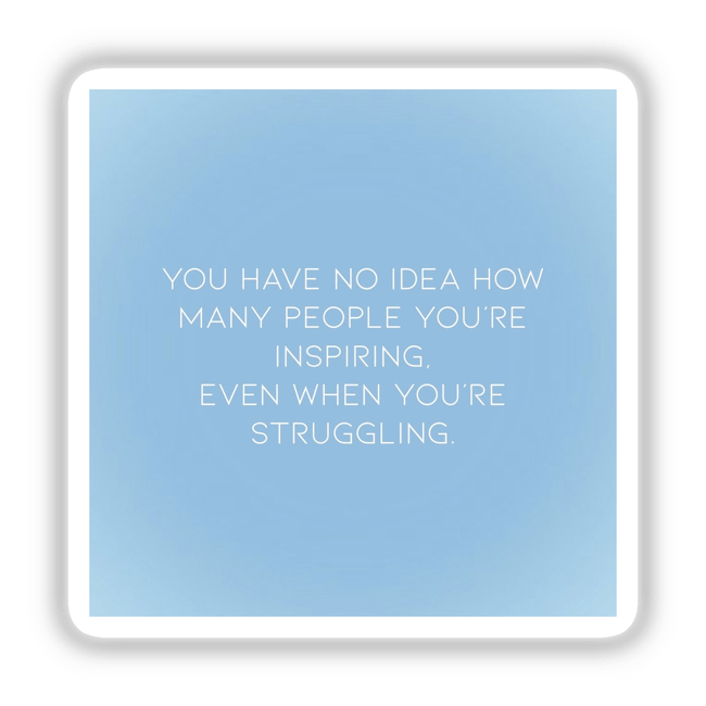 You have no idea how many people you’re inspiring, even when you’re struggling quote in modern font on a gradient blue background, available as a sticker or digital art.