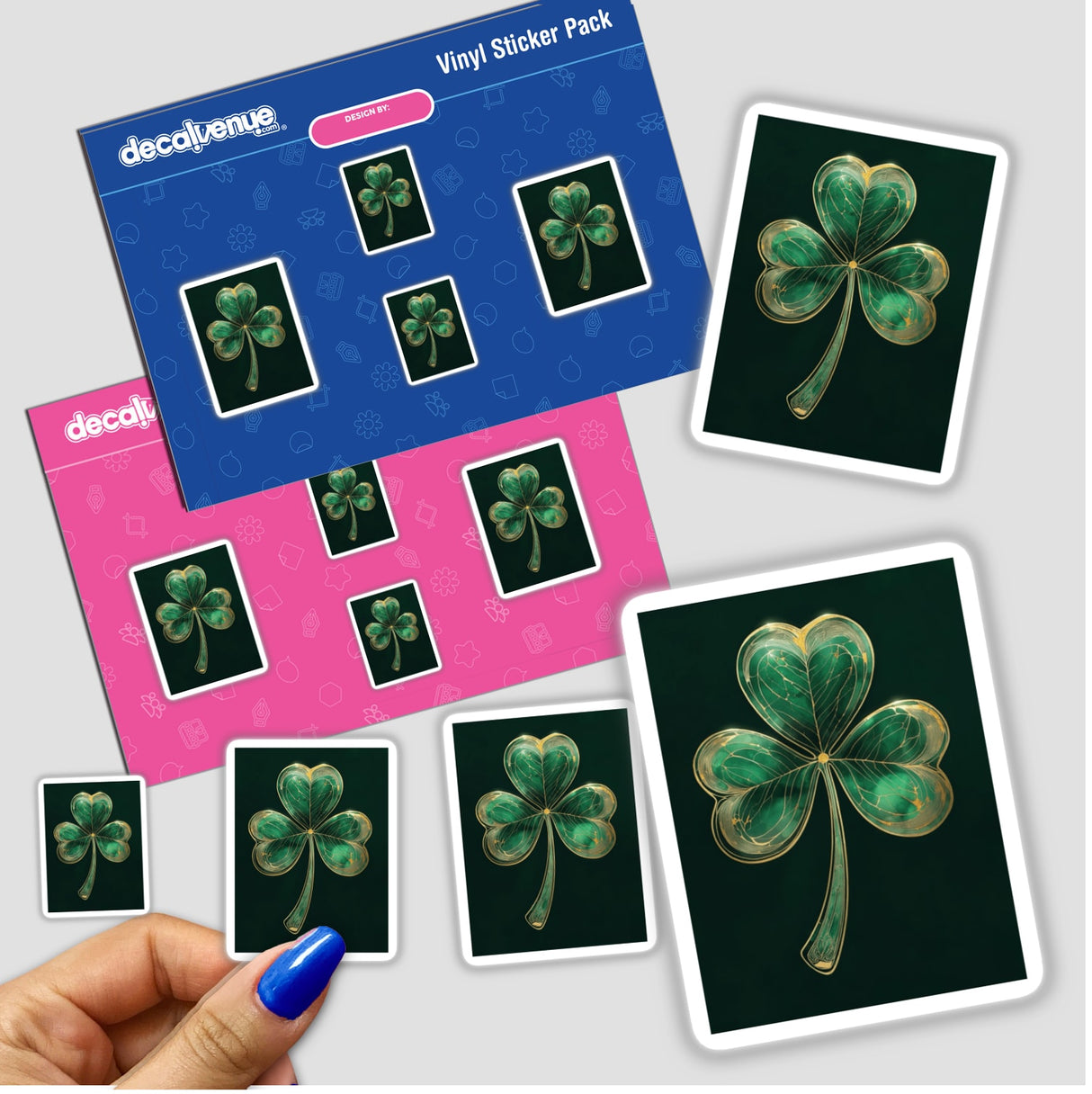 Minimalist Shamrock sticker pack, featuring elegant green clovers with delicate gold detailing, held in a hand. Available as stickers or digital artwork from Decal Venue.