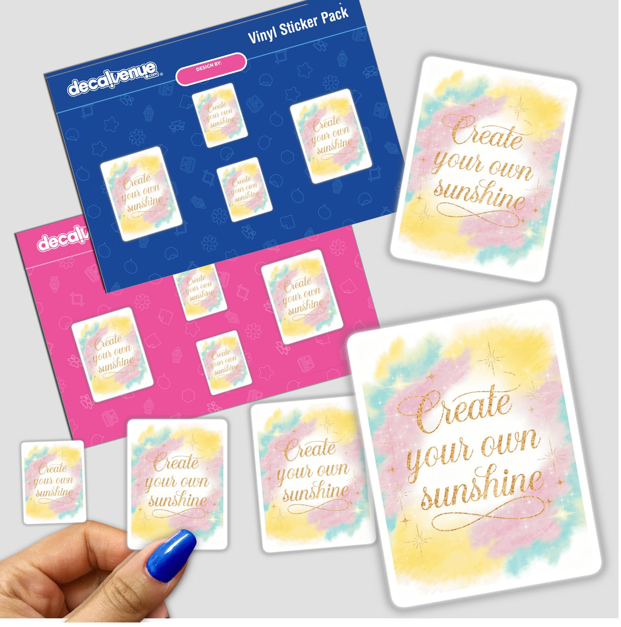 Hand holding a 'Create your own sunshine' sticker pack, showcasing unique vinyl designs available as stickers or digital artwork, embodying Decal Venue's creative flair.