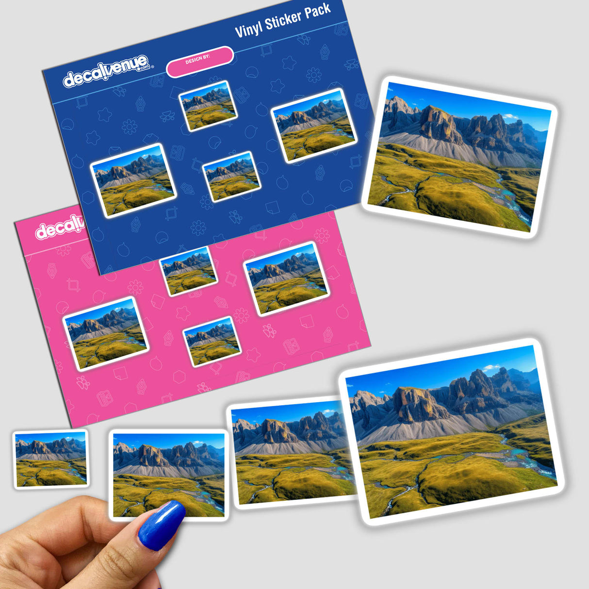 Sticker pack titled Majestic Rocky Cliffs Overlooking Verdant Valleys and Turquoise Streams featuring scenic mountain and river imagery, held in a hand, from Decal Venue's collection.