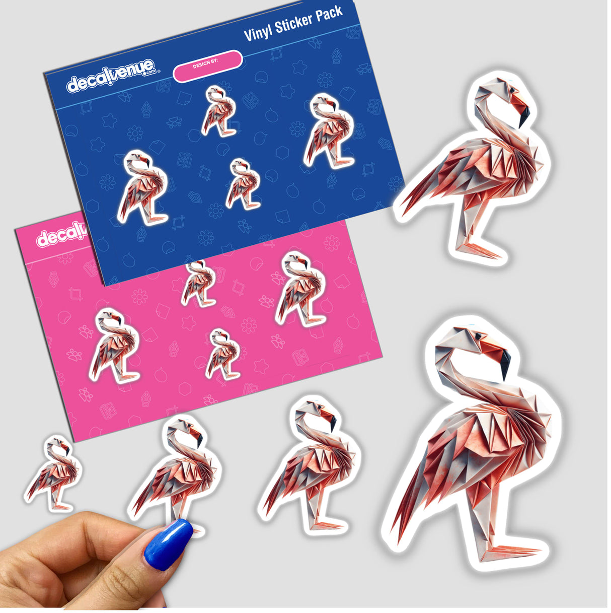 Origami Flamingo stickers showcased with a hand holding one, highlighting playful paper flamingo designs from DecalVenue. Ideal for crafting and DIY projects.