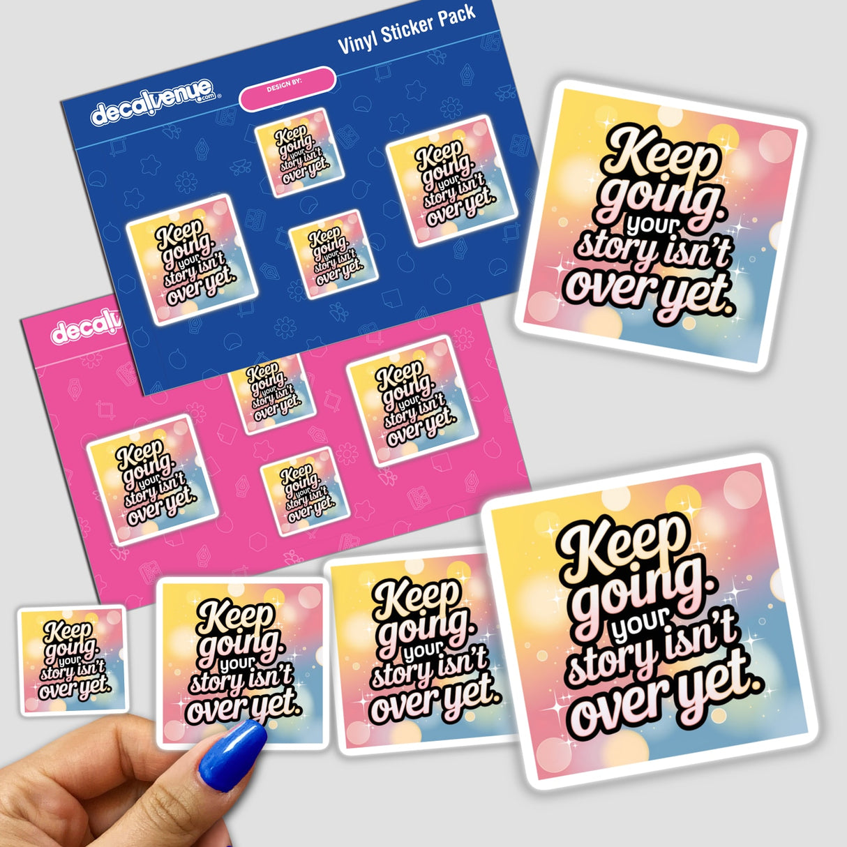 Hand holding 'Keep going. Your story isn’t over yet' sticker pack, showcasing unique vinyl designs ideal for personalization, available as stickers or digital artwork from Decal Venue.