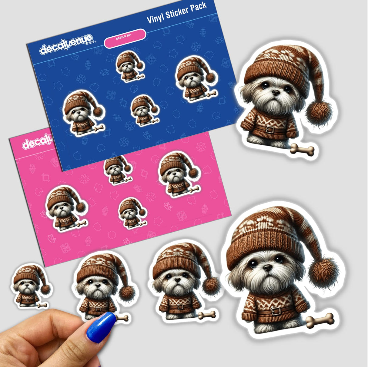 Shih Tzu Gnome with Dog Bone stickers featuring dogs in knitted clothes and hats, close-up of a finger showing sticker detail. Available as stickers or digital artwork.