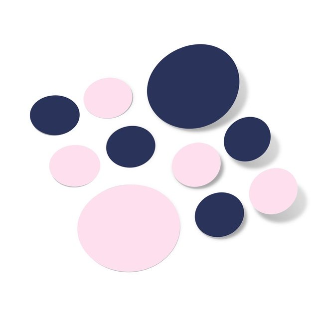 Baby pink and navy blue polka dot wall decals for nursery or room decor.