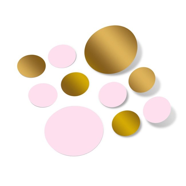 Baby pink and metallic gold polka dot wall decals in assorted sizes.