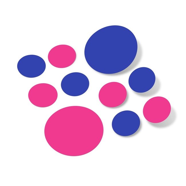 Hot pink and blue polka dot circle wall decals in varying sizes.