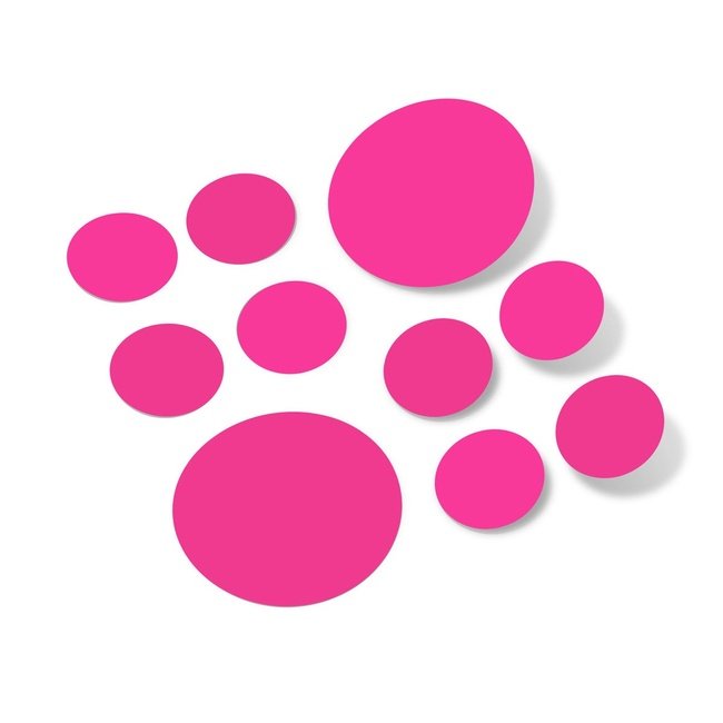 Hot pink polka dot circle wall decals in various sizes on a white background.