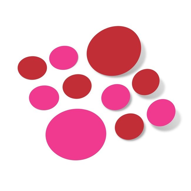 Hot pink and red polka dot wall decals on white background.