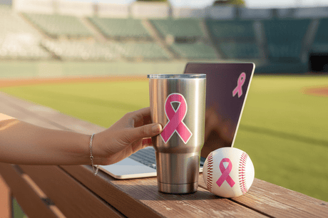 Baseball breast cancer ribbon stickers on tumbler, laptop, and ball, perfect for holiday gift ideas