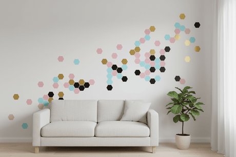 Modern living room with colorful hexagon wall decals creating a stylish accent above a neutral sofa