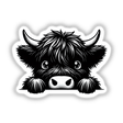 Peeking Highland Cow sticker or digital artwork featuring a charming cow with tufted hair peeking playfully, capturing the essence of Decal Venue's unique vinyl and digital art offerings.