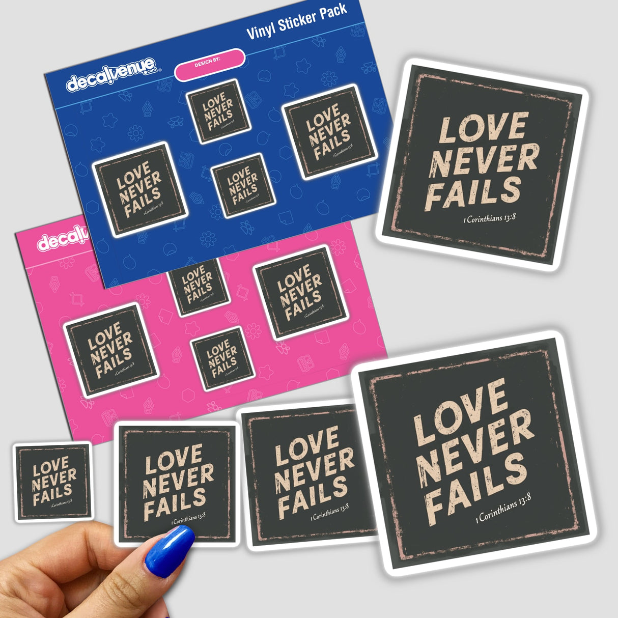 Hand holding Love Never Fails- 1 Corinthians 13:8 sticker from Decal Venue, showcasing unique Christian-themed design available as a sticker or digital artwork with commercial rights.