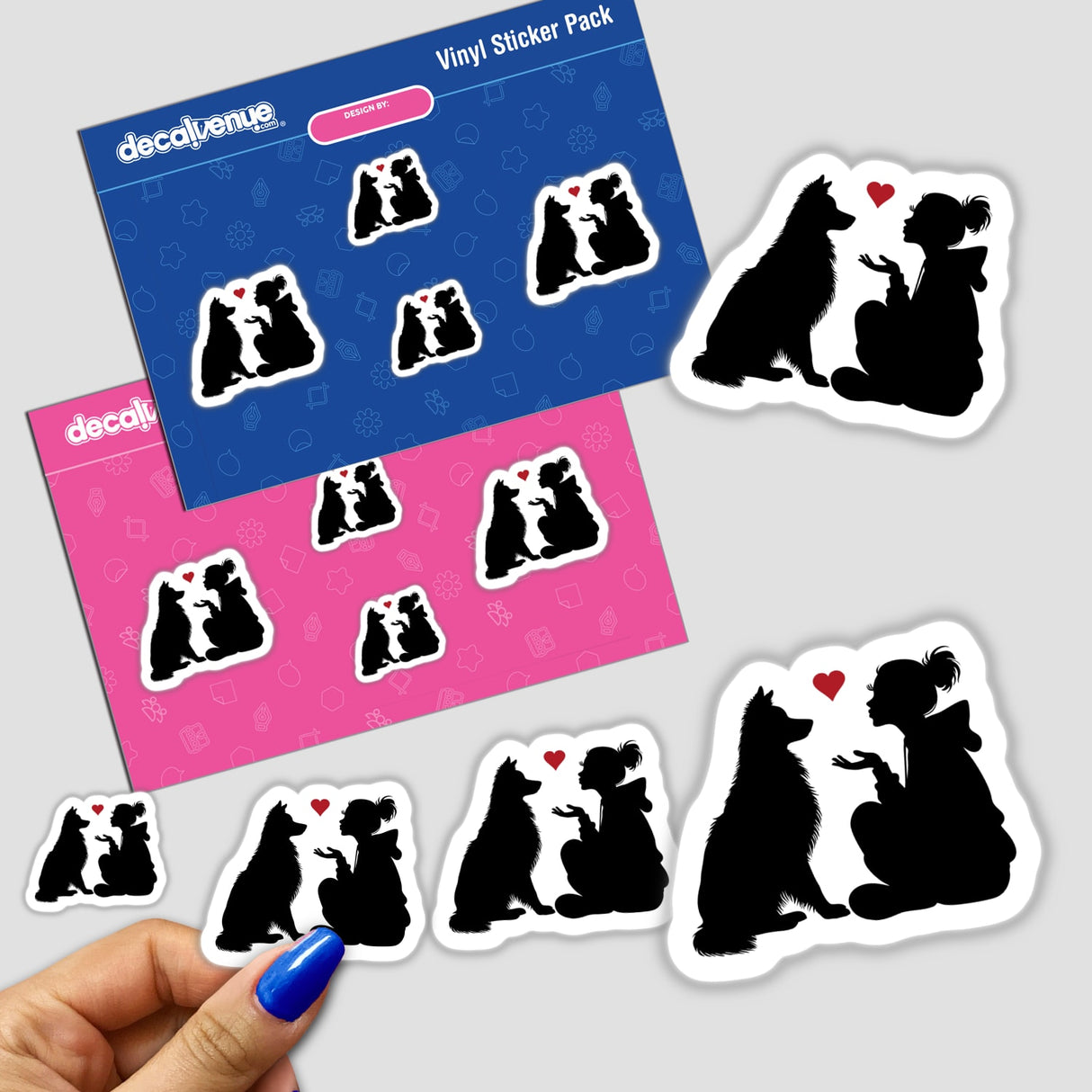 Vinyl stickers featuring silhouettes of sitting Australian Shepherd dogs and their owners in various poses, including couples and families.