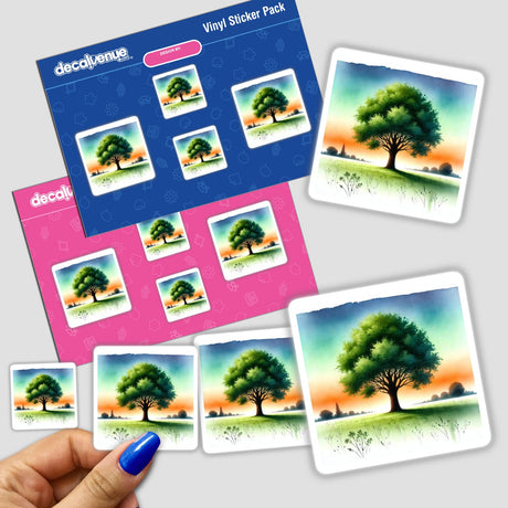 Solitary Tree in Sunset Field - Boho Watercolor Art stickers displayed on a table, featuring a serene tree in a vibrant field, available as stickers or digital artwork.