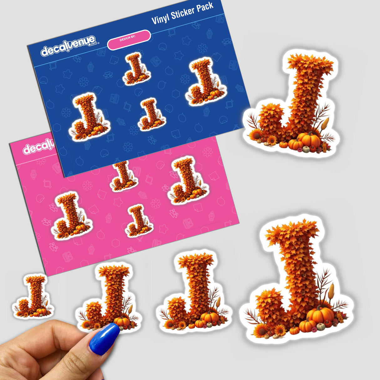 Thanksgiving Letter J Clipart featuring fall leaves and pumpkins, available as stickers or for commercial download.