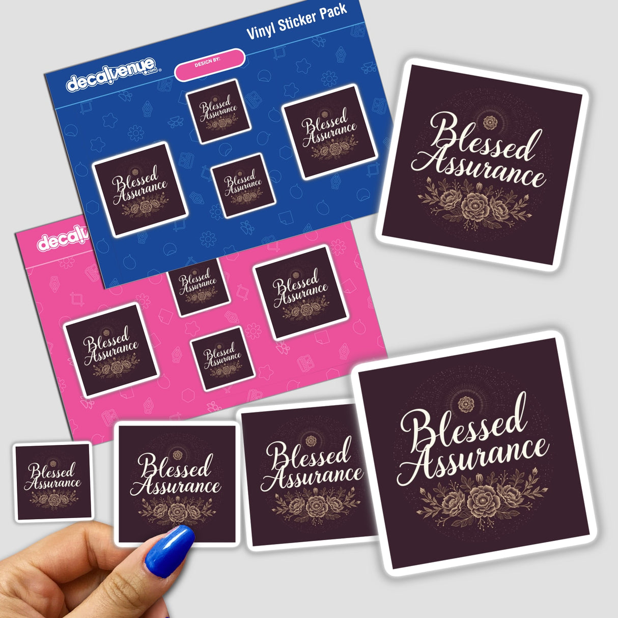 Hand holding a Blessed Assurance Hymn Typography Design Sticker pack, showcasing intricate lettering associated with Decal Venue's unique stickers and digital art collection.