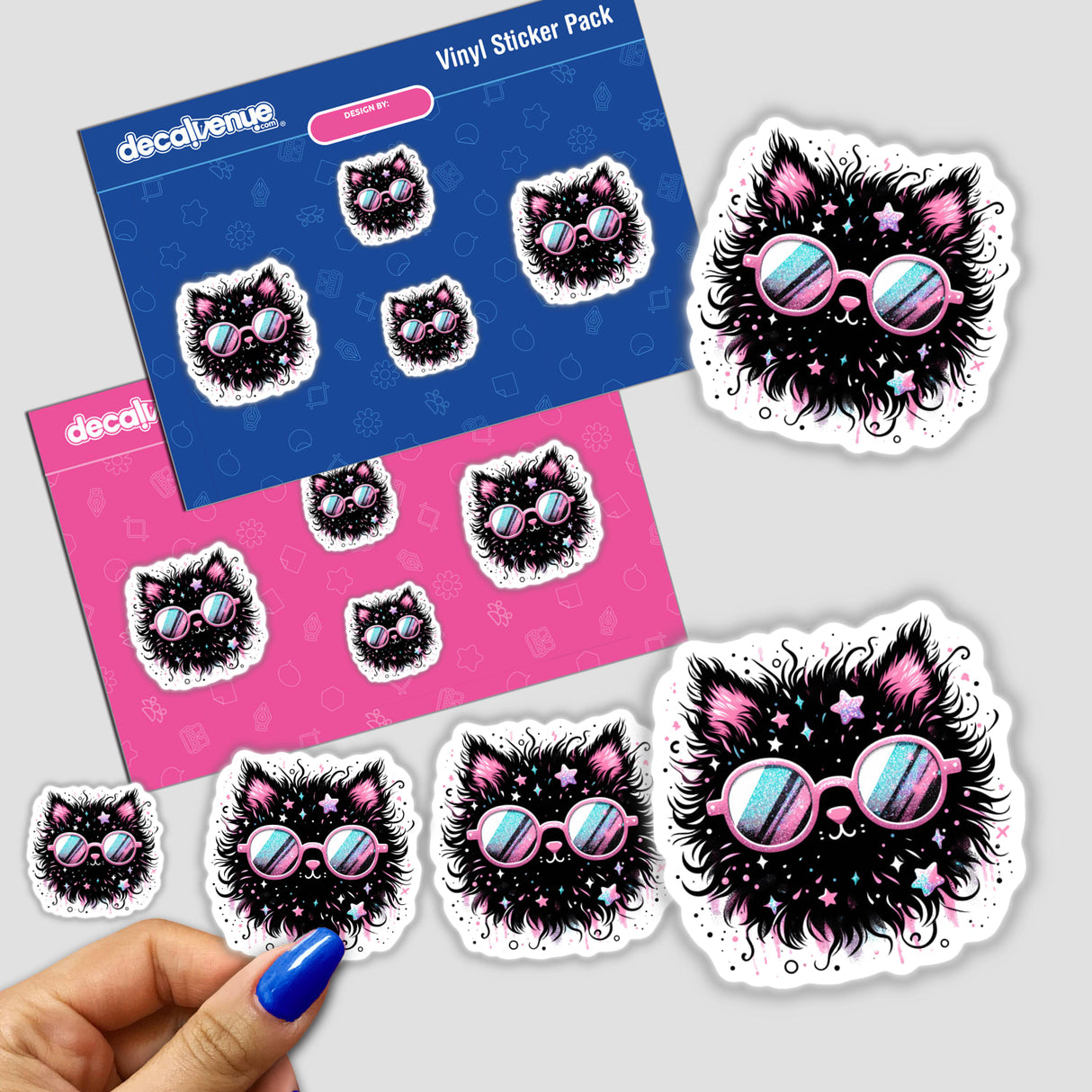 Stylish black cat stickers with neon sunglasses surrounded by colorful sticker packs on a Decal Venue background