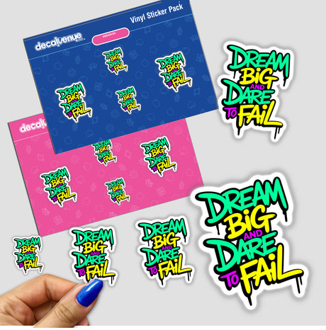 Dream Big And Dare To Fail motivational quote sticker pack featuring vibrant, colorful text designs in a close-up of a hand holding the pack. Available as stickers or digital artwork.