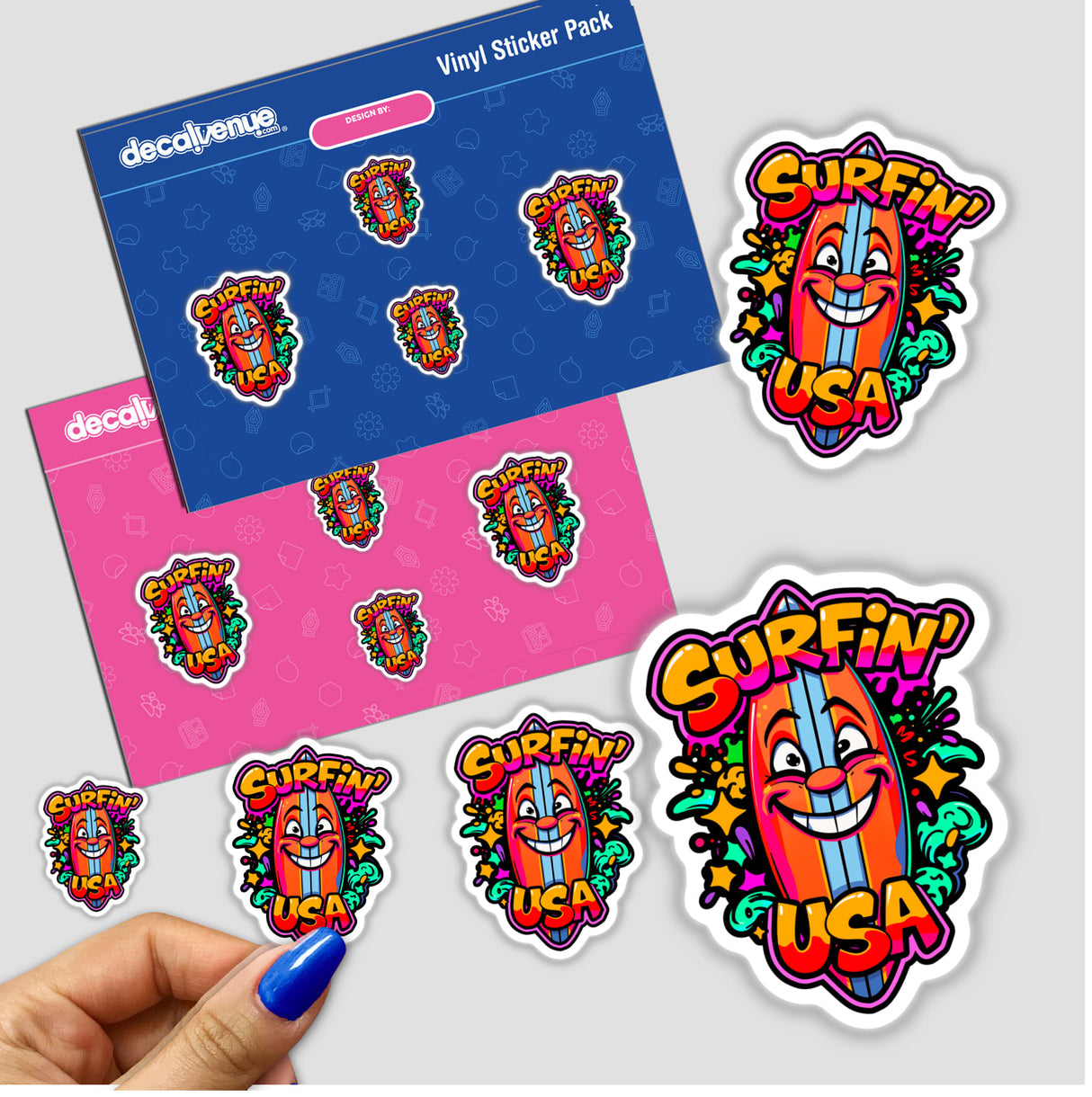 a hand holding a sticker next to a pack of stickers